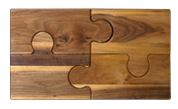 Novelty 4 piece walnut puzzle cutting board