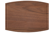 Arched wood cutting board with juice groove